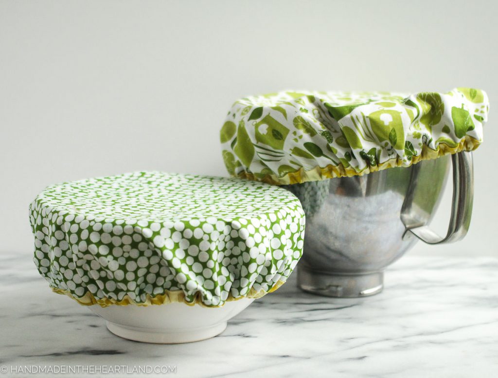 picture of 2 bowls with fabric mixing bowl covers covering the tops of each bowl
