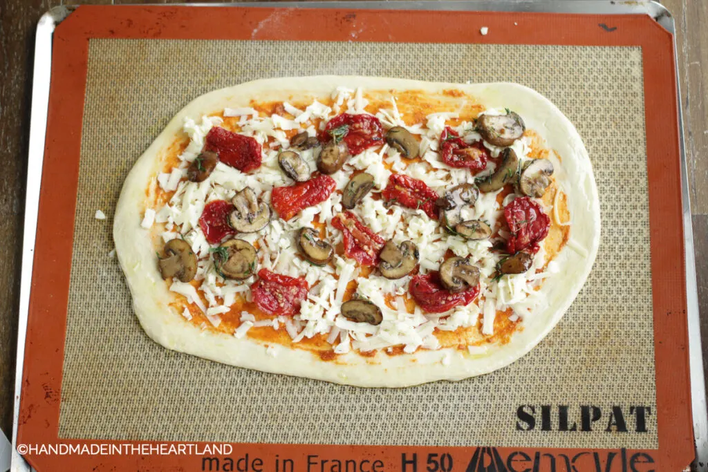 pizza being cooked on a Silpat
