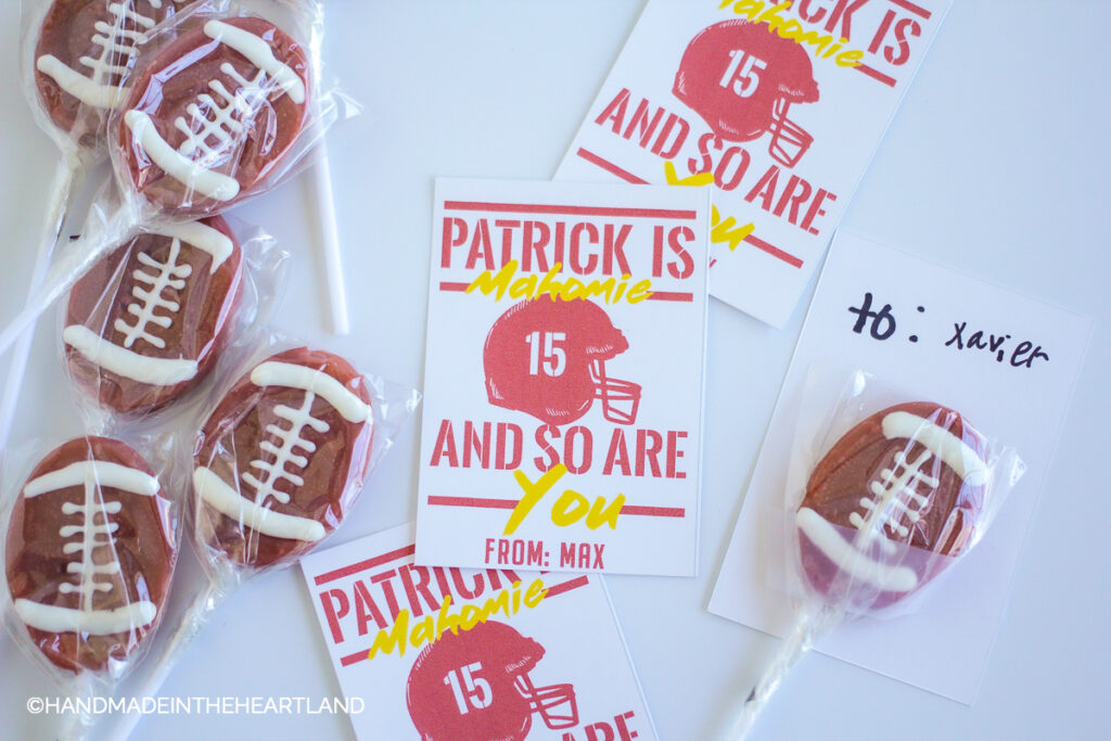 printed cards that say "Patrick is Mahomie and so are you" with football suckers