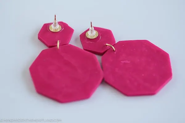 Back of bright pink hexagon polymer clay earrings