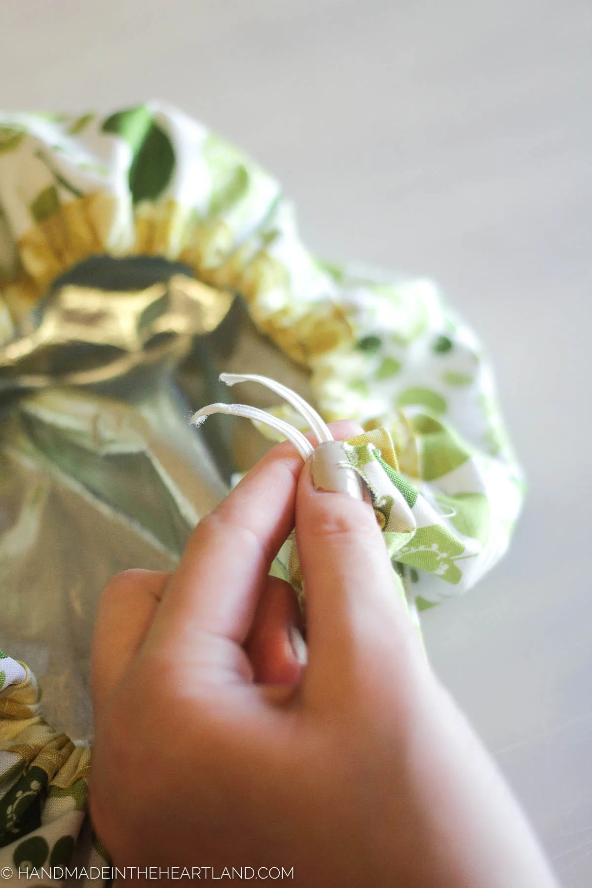 elastic that has been pulled through the bias tape of the mixing bowl cover