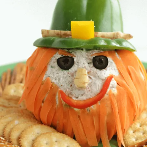 Cheeseball appetizer decorated to look like a leprechaun