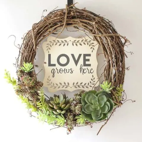 spring wreath made with faux succulent plants