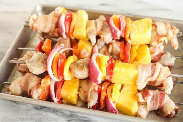 Fresh bacon wrapped shrimp kabobs ready to grill
