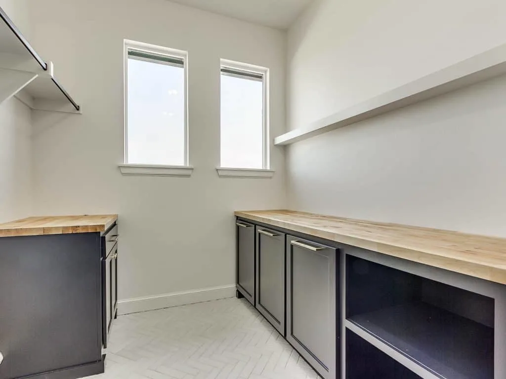 Laundry room lower cabinets & hampers painted Tricorn Black