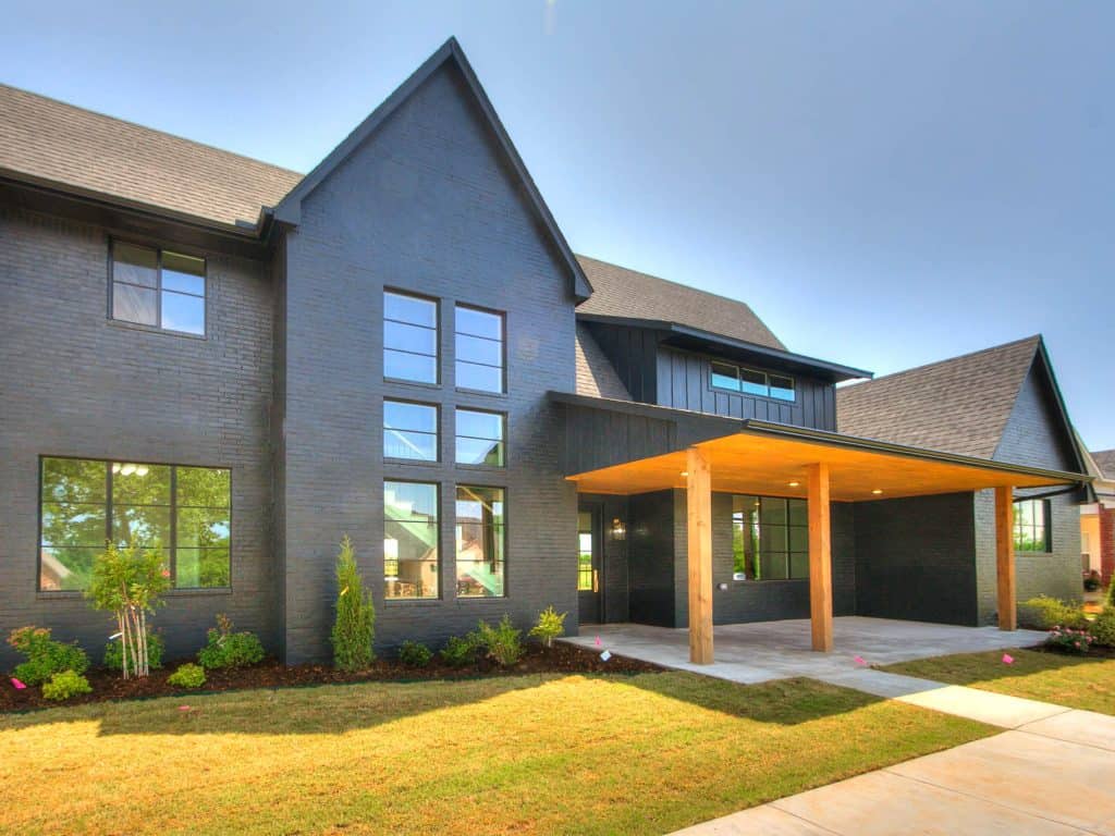 Exterior of a modern farmhouse painted Tricorn Black