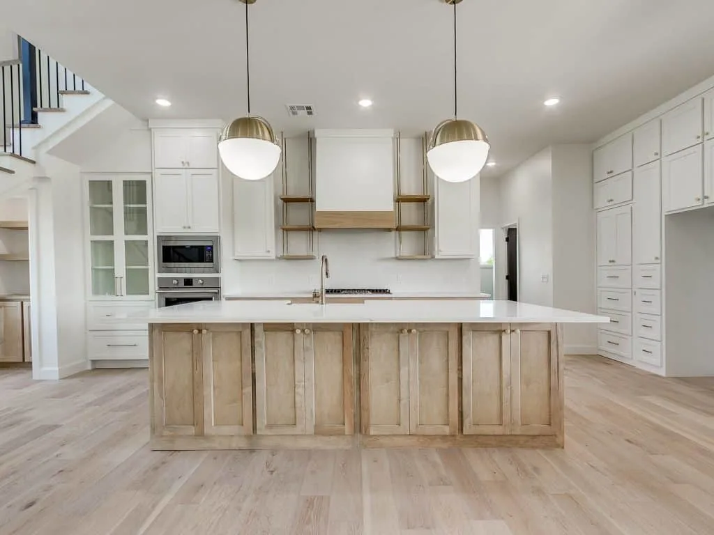 Modern farmhouse kitchen painted pure white with weathered oak wood stain