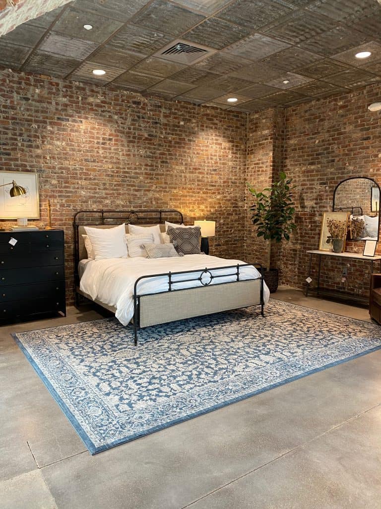 Bedroom furniture display at Magnolia Home