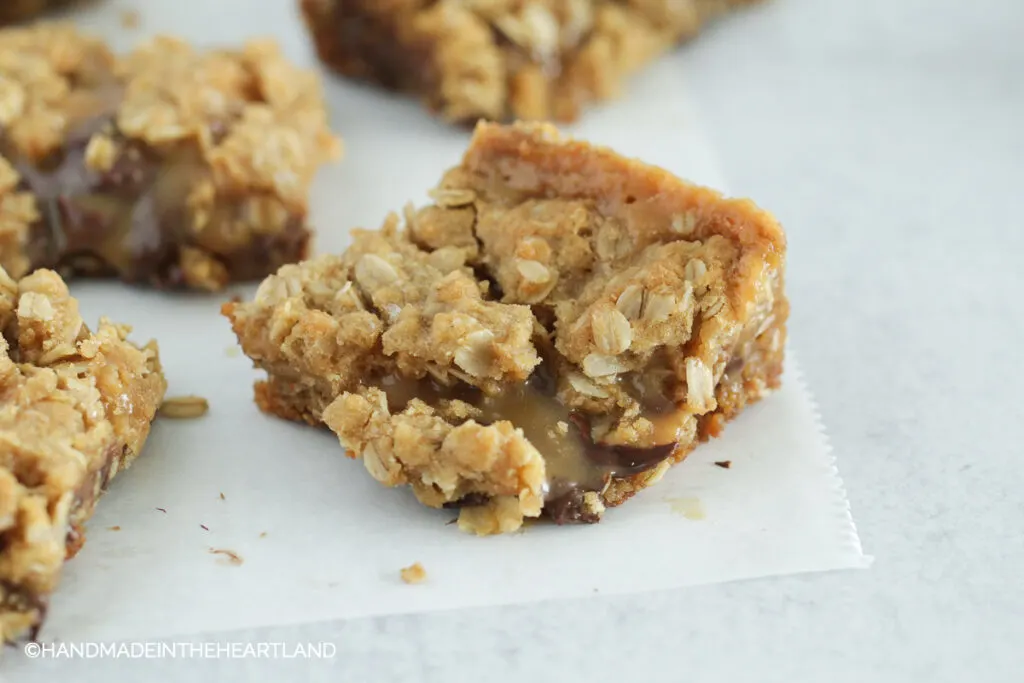 square of bar cookies with oats, chocolate, caramel & sea salt