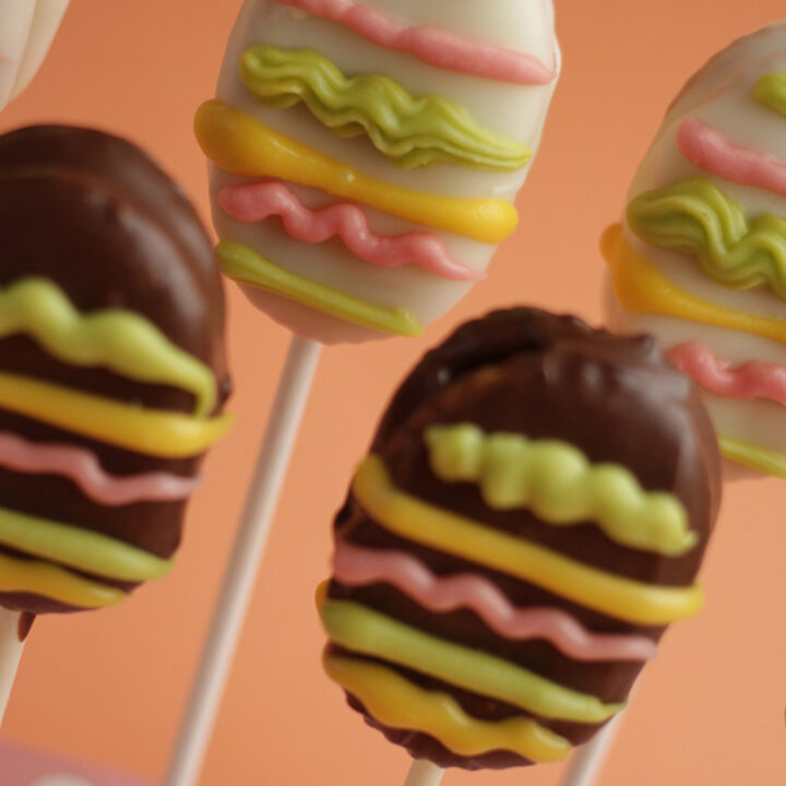 oval crackers sandwiched with peanut butter and then covered in chocolate and decorated to look like Easter Eggs