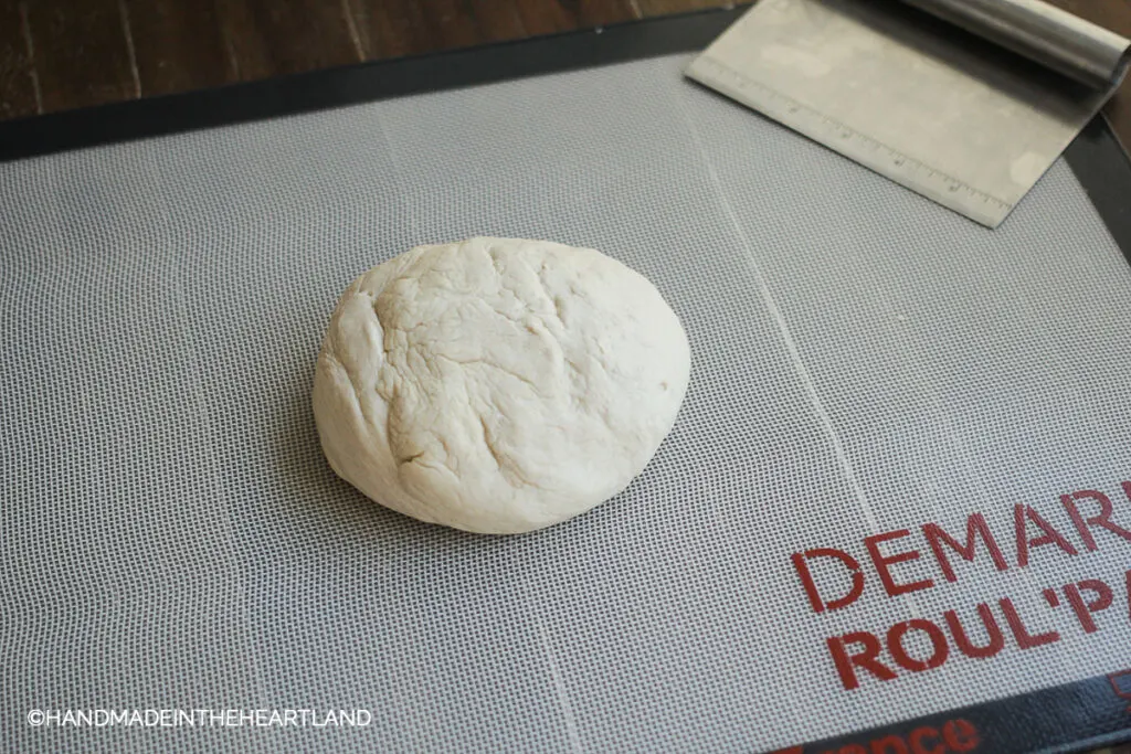 dough rolled into ball to rest for 10 minutes