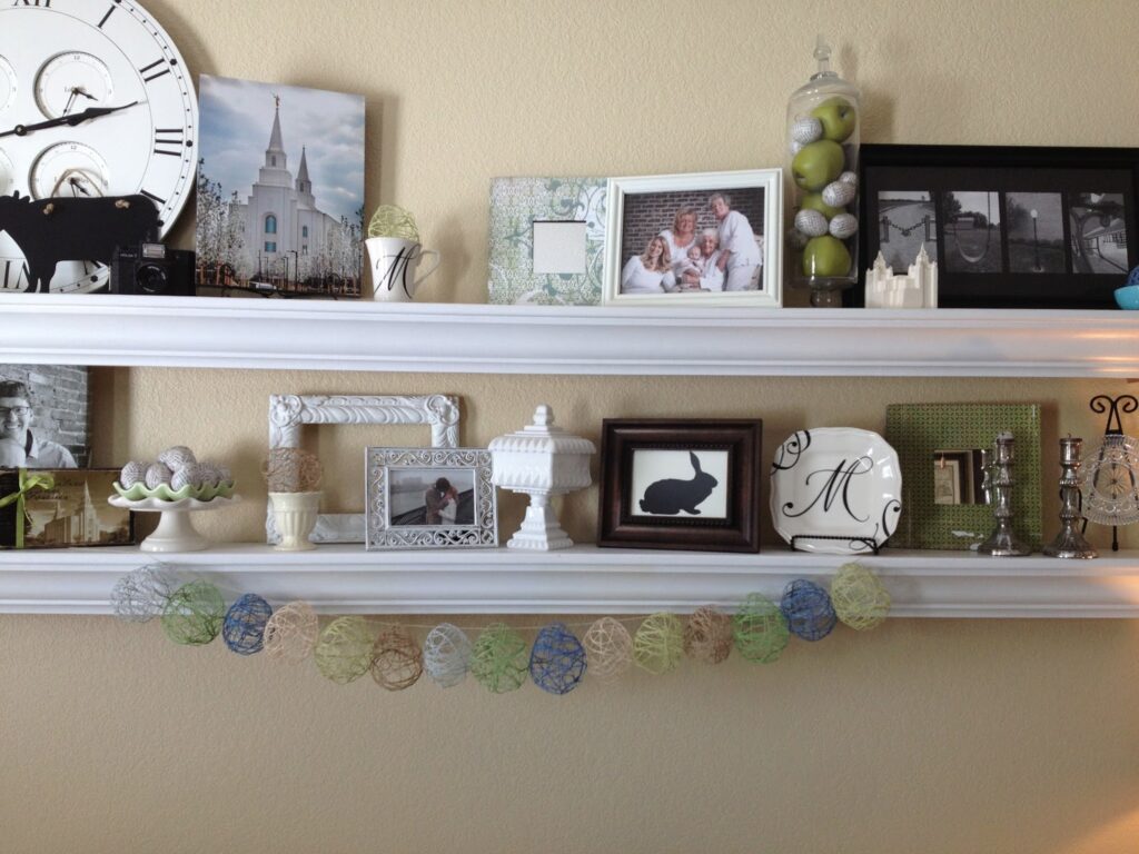 Easter decorated wall shelves with decoupaged book page easter eggs