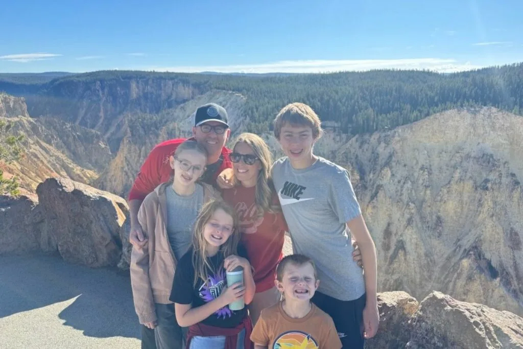 Family photo at the grand canyon of Yellowstone