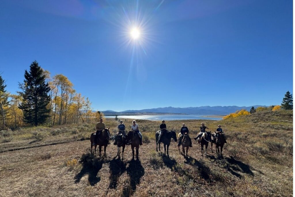 Family of 7 on horses in Yellowstone National Park for a trail ride