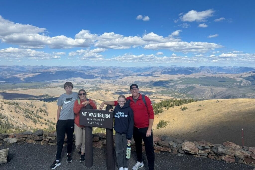 Family of four at the Summit of Mt.Washburn in Yellowstone National Park