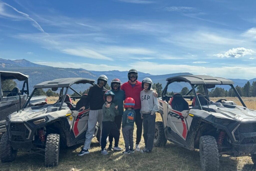 Family riding side by sides in big sky montana
